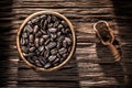 Ground coffee beans bowl scoop on wooden board Royalty Free Stock Photo