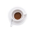 Ground coffee beans in white cup isolated Royalty Free Stock Photo