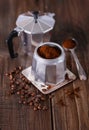 Ground coffee and coffee beans in a Moka Pot Royalty Free Stock Photo