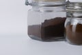 ground coffee in glass jars of different shades Royalty Free Stock Photo