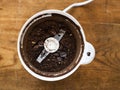 Ground coffee in grinder