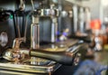 ground coffee pouring into a portafilter with a grinder Royalty Free Stock Photo