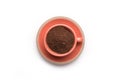 Ground coffee powder in cup isolated on a white background Royalty Free Stock Photo