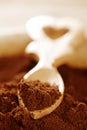 Ground coffee powder in heart shape Royalty Free Stock Photo