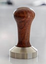 Ground coffee tamper