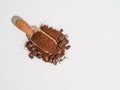 Ground coffee in wooden spoon isolated on white background. Royalty Free Stock Photo