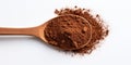 Ground Coffee In Wooden Spoon On White Background. Pile Of Instant Cocoa Drink. Top View Of Coffee Powder Heap Royalty Free Stock Photo