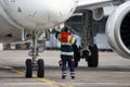 A ground control manager prepares for departing of aircraft