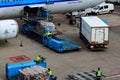 Ground crew preparing the KLM Royal Dutch Airlines airplane for the flight