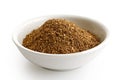 Ground cumin in white ceramic bowl. Royalty Free Stock Photo