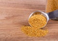 Ground Cumin on a Wooden Table