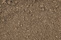 Ground detailed texture, brown background. Arable land Royalty Free Stock Photo