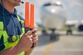 Ground marshaller standing on the landing field