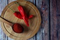 Ground red hot pepper in a wooden spoon Royalty Free Stock Photo