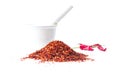 Ground red pepper and a vintage mortar Royalty Free Stock Photo