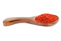 Ground red pepper in a wooden spoon Royalty Free Stock Photo