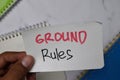 Ground Rules text on sticky notes isolated on office desk