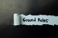 Ground Rules Text written in torn paper