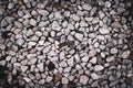 Ground stone grey background of many small stones. Rock texture background Royalty Free Stock Photo