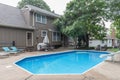 In-ground swimming pool with slide in Lenexa, Kansas Royalty Free Stock Photo