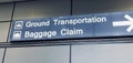 Ground transportation and baggage claim sign with an arrow in an airport Royalty Free Stock Photo