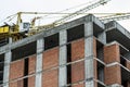 Ground view of a new modern residential house building under construction. Real estate development concept. Multi story home from Royalty Free Stock Photo