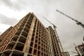 Ground view of a new modern residential house building under construction. Real estate development concept. Multi story home from Royalty Free Stock Photo