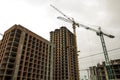 Ground view of a new modern residential house building under construction. Real estate development concept. Multi story home from Royalty Free Stock Photo