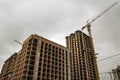 Ground view of a new modern residential house building under construction. Real estate development concept. Multi story home from Royalty Free Stock Photo