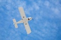 Ground view of a small plane flying in Turkey Royalty Free Stock Photo