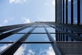 Ground view of tall glass building wall Royalty Free Stock Photo