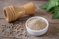 Ground white pepper in bowl and pepper shaker Royalty Free Stock Photo