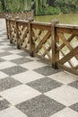 The ground with wooden guardrail in park