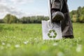 Groundbreaking ceremony with a sustainability symbol on the spade