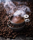 Grounded coffee, beans, coffe maker and spicces Royalty Free Stock Photo