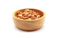 Roasted peanuts in a wooden bolw Royalty Free Stock Photo