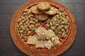 Groundnuts, ground nuts gachak sesame seeds rewari and gachak in a decorative plate lohari festival winter India.