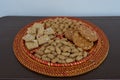Groundnuts, ground nuts gachak sesame seeds rewari and gachak in a decorative plate lohari festival winter India.