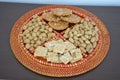 Groundnuts, ground nuts gachak sesame seeds rewari and gachak in a decorative plate lohari festival winter India.