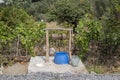 Groundwater wells in the countryside with chains and bucket, Water well in the nature