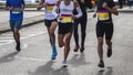 Group of active people running,marathon runners on the city road Royalty Free Stock Photo