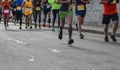 Group of active people running,marathon runners on the city road Royalty Free Stock Photo