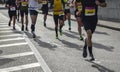 Group of active people running,marathon runners on the city road Royalty Free Stock Photo