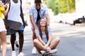 Group of active teenagers making recreational activity in an urban area. Royalty Free Stock Photo