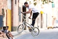 Group of active teenagers making recreational activity in an urban area. Royalty Free Stock Photo