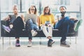 Group Adult Hipsters Friends Sitting Sofa Using Modern Gadgets.Business Startup Friendship Teamwork Concept.Creative Royalty Free Stock Photo