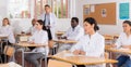 Group of adult medical students listening to lecture in classroom Royalty Free Stock Photo