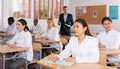 Group of adult medical students listening to lecture in classroom Royalty Free Stock Photo