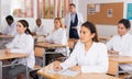 Group of adult medical students listening to lecture in classroom Royalty Free Stock Photo