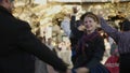 Group of adults in typical Zaragoza costume dancing the jota